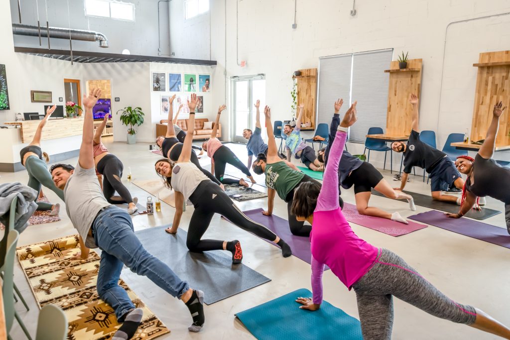 The Wholesome Goods team during a yoga session at the Clearwater office