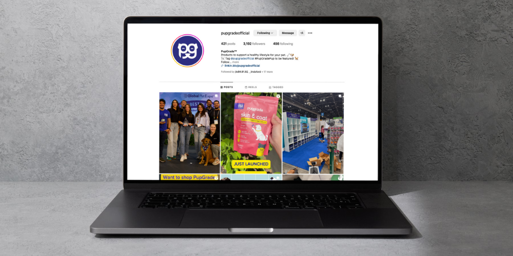 open laptop with PupGrade Instagram social media on the screen