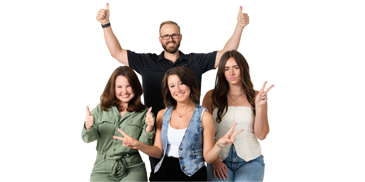The Wholesome Goods Research & Content team posing playfully, with thumbs up, peace signs, and big smiles.