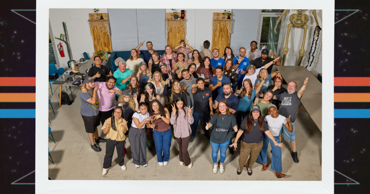 The Wholesome Goods team gathered for the 8th anniversary celebration, smiling and posing together at HQ.